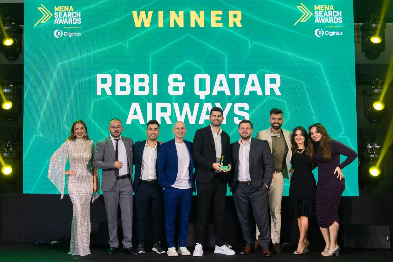 Aziz Hamidov with the RBBi team accepting the MENA Search Awards for Qatar Airways, Dubai 2023